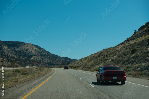 Amazing sunlight near Monument Valley, Arizona, USA, Highway in Monument Valley, Utah, Arizona, USA, Recreational vehicle on the highway, Monument Valley, USA © sutthinon602