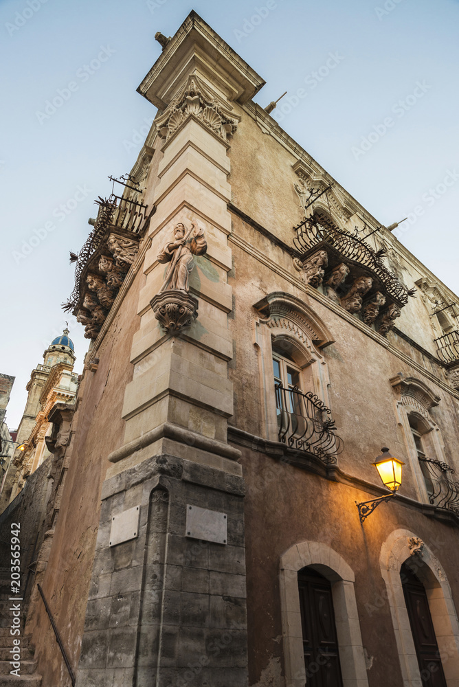 Facade of an old building in Ragusa, Sicily, Italy