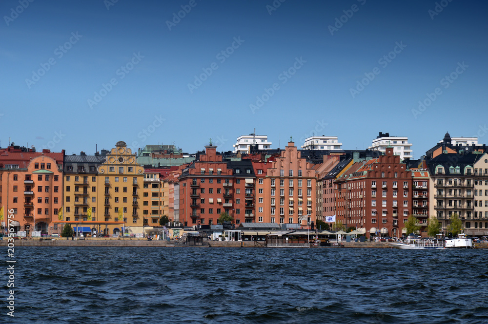 Waterside settlement full of iconic buildings at port of Kungsholmstorg brygga in Stockholm, Sweden