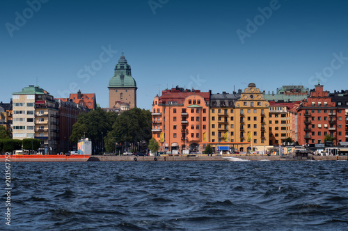 Waterside settlement full of iconic buildings at port of Kungsholmstorg brygga in Stockholm, Sweden photo