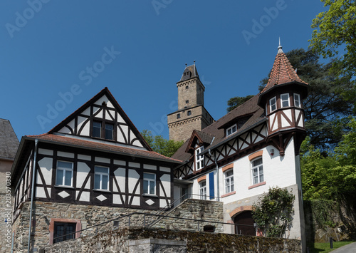 View on half timbered houses and castle tower in the historic old town of Kronberg im Taunus, Hesse, Germany