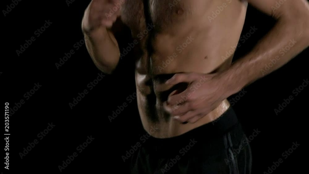 Man running slow motion. Naked white man with black short and six packs muscle running. Super slow motion. Man running slow motion. Naked white man with black short and six packs muscle running. Super slow motion.