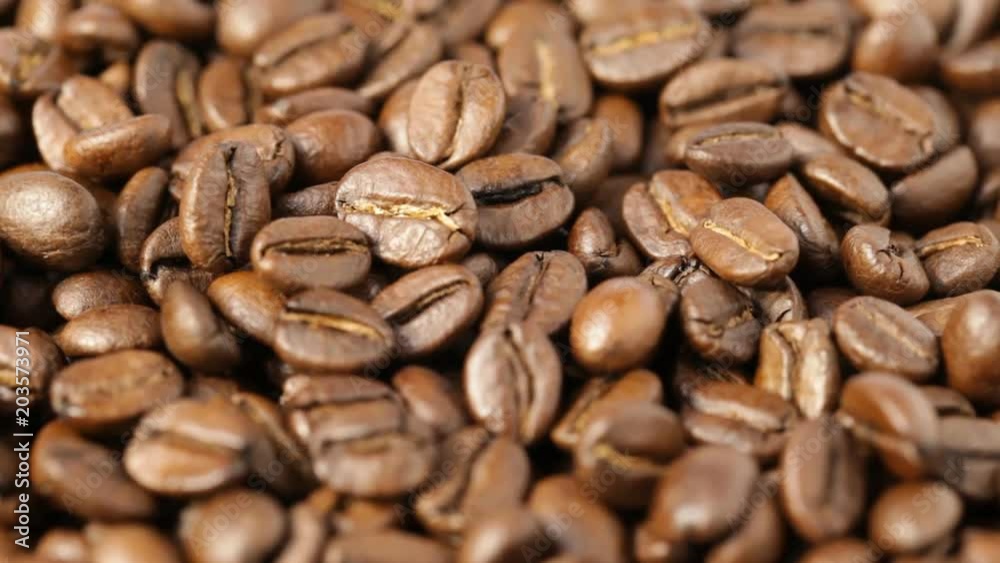 Close up of rotating Coffee Beans. No sound. Close up of rotating Coffee Beans. No sound.