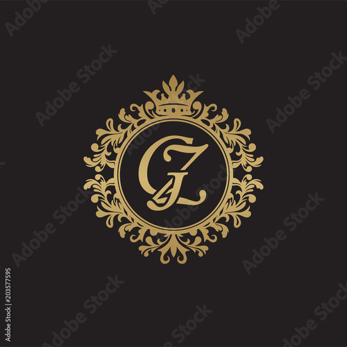Initial letter GZ, overlapping monogram logo, decorative ornament badge, elegant luxury golden color