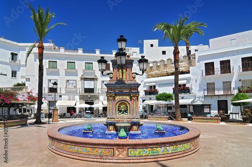 Ceramic tile water feature in the Plaza de Espana, Vejer de la Frontera, Costa de la Luz, Province of Cadiz, Andalusia. photo