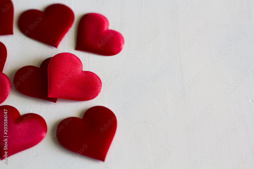 Hearts on white wooden background Hearts on white wooden background