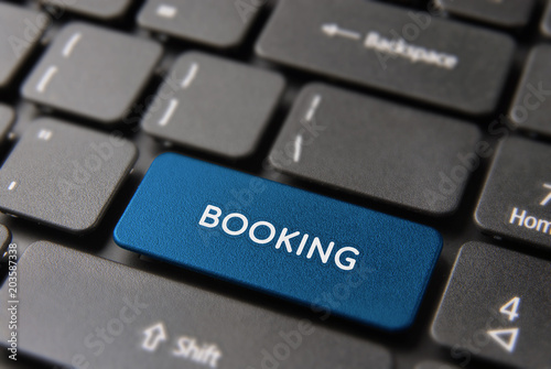 Online hotel booking reservation on computer key