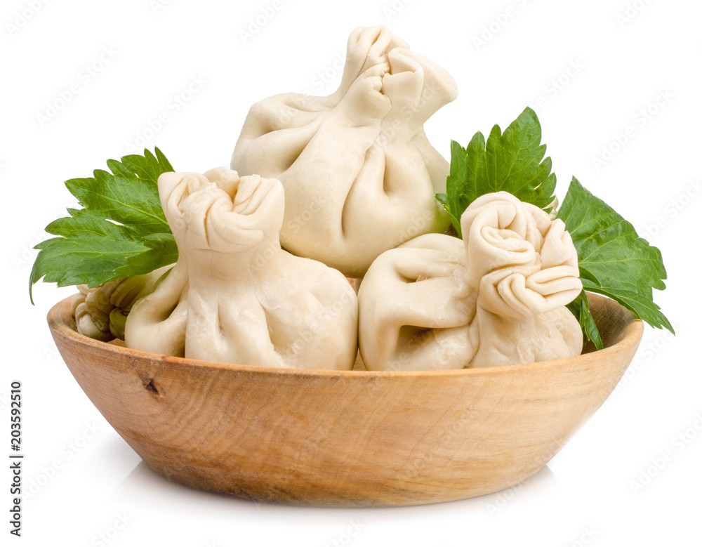 Khinkali, a georgian dumpling, on a white background Khinkali, a georgian dumpling, on a white background