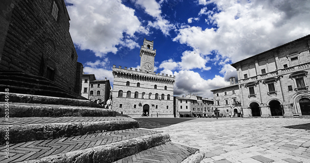 MONTEPULCIANO SQUARE AND CITY HALL. BEAUTYFUL IDYLLIC TUSCNAY HISTORIC CITYSCAPE. TOP ATTRACTION IN ITALY. FAMOUS TRIP DESTINATION