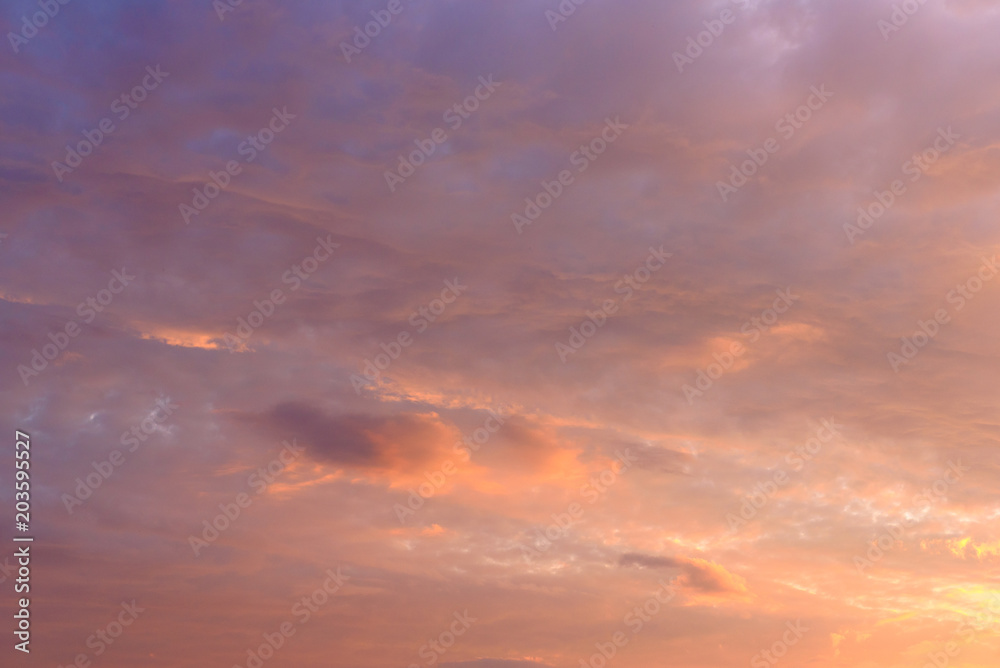 Background of the pastel color evening sky and amazing clouds.