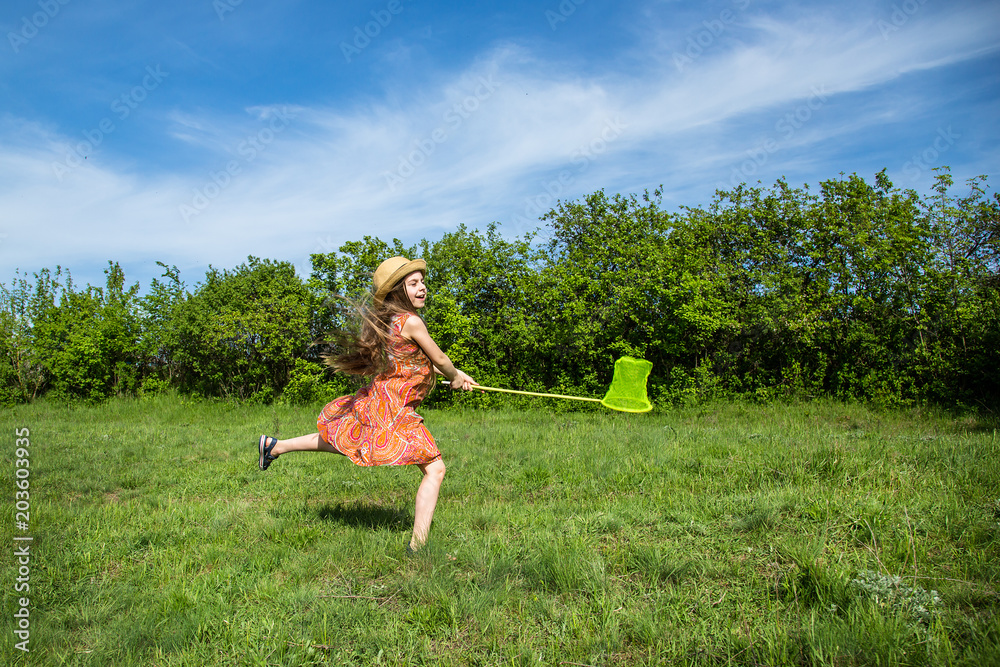 Girl with a ring on a summer field. Sunny day. Girl with a ring on a summer field. Sunny day.