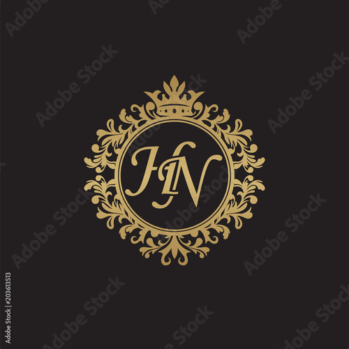Initial letter HN, overlapping monogram logo, decorative ornament badge, elegant luxury golden color