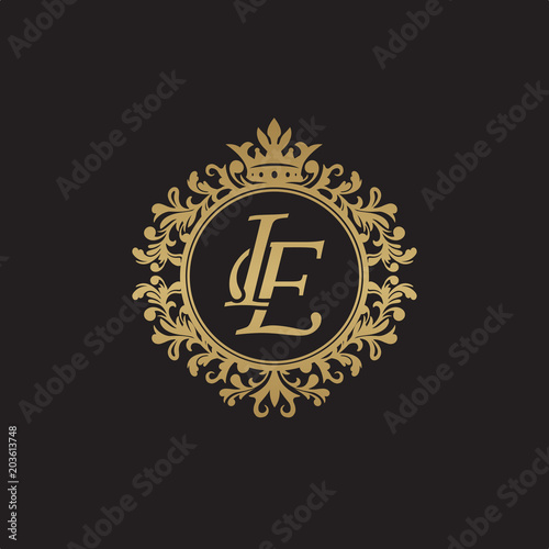 Initial letter IE, overlapping monogram logo, decorative ornament badge, elegant luxury golden color