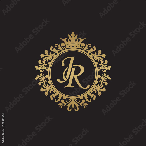 Initial letter JR, overlapping monogram logo, decorative ornament badge, elegant luxury golden color