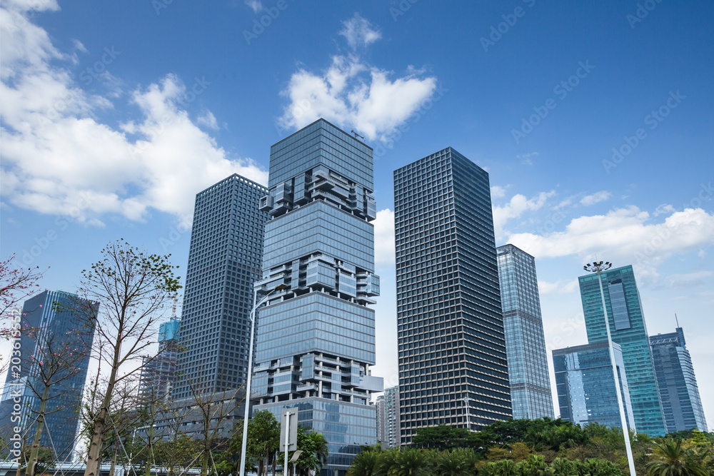 Modern office building against blue sky.