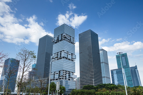 Modern office building against blue sky. © hallojulie