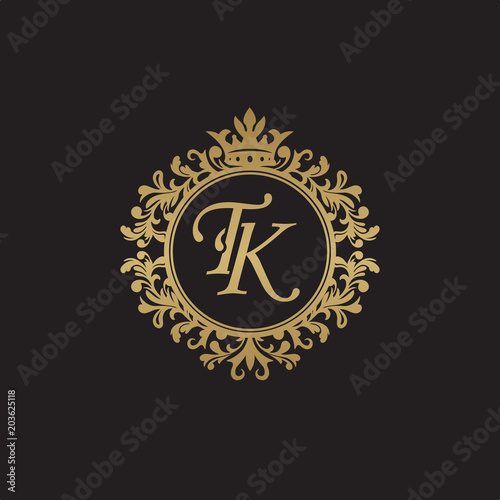 Initial letter TK, overlapping monogram logo, decorative ornament badge, elegant luxury golden color