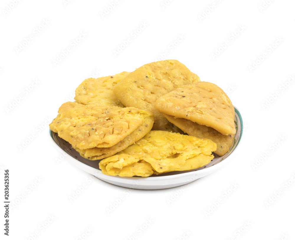 Indian Bakery Food called as Khari Snack, Khari Biscuit or Jeera Khari, Indian Tea Time Snack isolated on white background Indian Bakery Food called as Khari Snack, Khari Biscuit or Jeera Khari, Indian Tea Time Snack isolated on white background