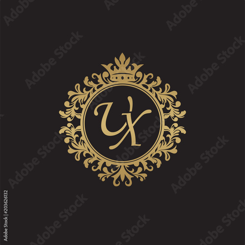 Initial letter UX, overlapping monogram logo, decorative ornament badge, elegant luxury golden color