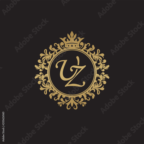 Initial letter UZ, overlapping monogram logo, decorative ornament badge, elegant luxury golden color