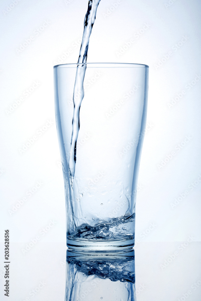 Glass cup with water on a white background. Glass cup with water on a white background.