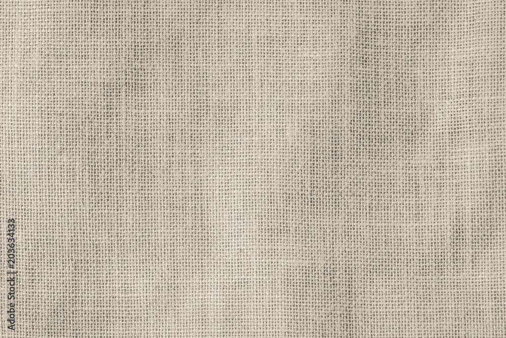 Hessian sackcloth woven texture pattern background in light sepia cream beige brown color - obrazy, fototapety, plakaty 