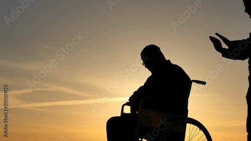 psychic medium making a session with patient silhouettes on sky background photo