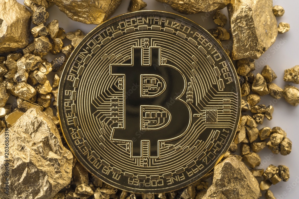 Golden Bitcoin Coin and mound of gold. Bitcoin cryptocurrency.