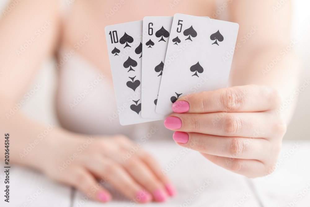 ladies gathered playing black jack cards for money ladies gathered playing black jack cards for money