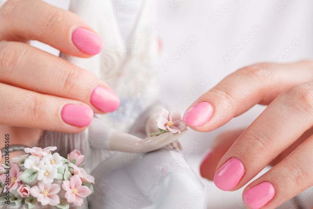 Female hands with parcelain figurine Female hands with parcelain figurine