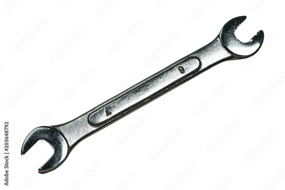 Old grungy wrench on white background. Isolated image of antiquare spanner. Old grungy wrench on white background. Isolated image of antiquare spanner.