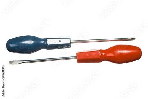 Isolated image of flat and cross screwdrivers. Flathead and crosshead screwdrivers on white background. Two handy tools.