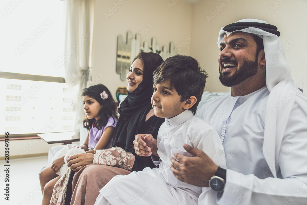 Naklejka premium Arabic happy family lifestyle moments at home