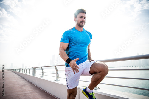 Photography Beautiful man doing work out and different exercises outdoor