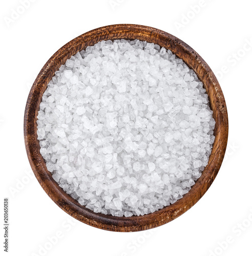 Sea salt in wooden bowl top view