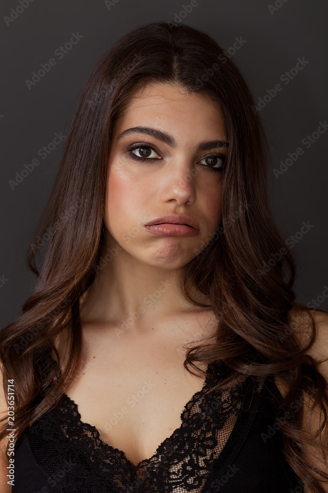 Beautiful and fed up woman portrait snorting