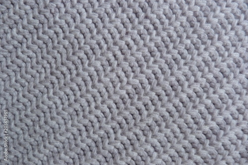 Wallpaper Mural knitted scarf close-up beige knitted fabric yarn wool acrylic cotton natural thread close-knit vintage background for decoration hand-made background made by hand Torontodigital.ca