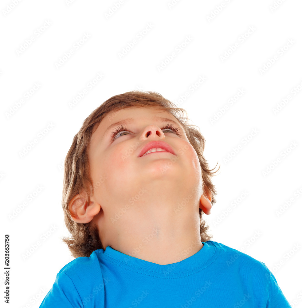 Pensive small child looking up Pensive small child looking up