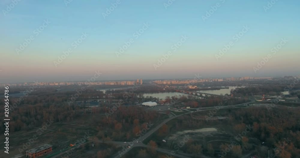 Aerial view dusk river. Golden and bleu hour sunset over the river Drone view over the golden sunset Beautiful Sunset Aerial Shot Fly over the river and sunset reys over the trees and branches Aerial view dusk river. Golden and bleu hour sunset over the river Drone view over the golden sunset Beautiful Sunset Aerial Shot Fly over the river and sunset reys over the trees and branches