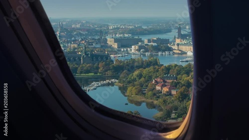 Aerial view of Stockholm seen through a plane window. Montage.
