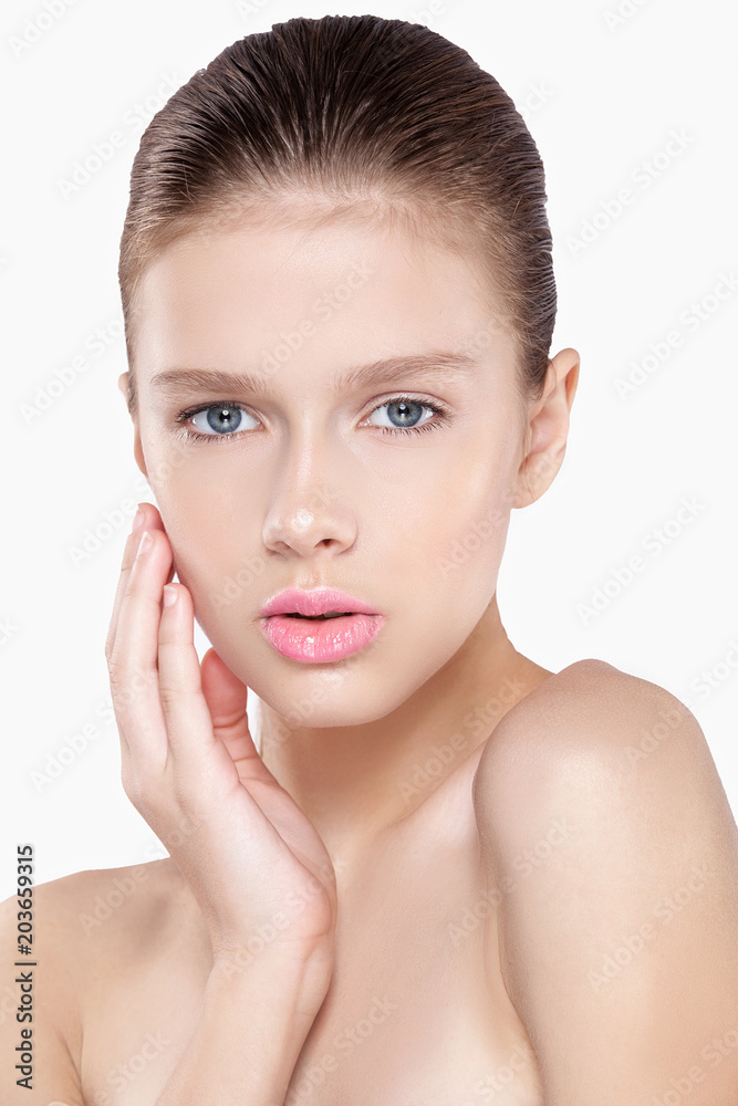 beauty of a woman's face. Natural makeup, pink lips, clean skin. Isolated white background. beauty of a woman's face. Natural makeup, pink lips, clean skin. Isolated white background.