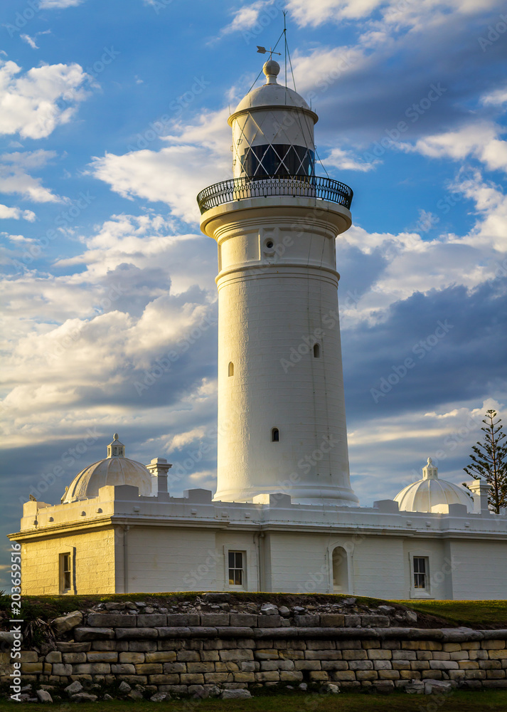 The top of the Lighthouse against a clear blue sky with copyspace