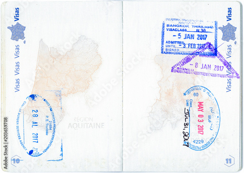 Stamps of Canada, United States and Thailand in a French passport photo