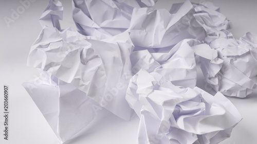 crumpled paper on white table