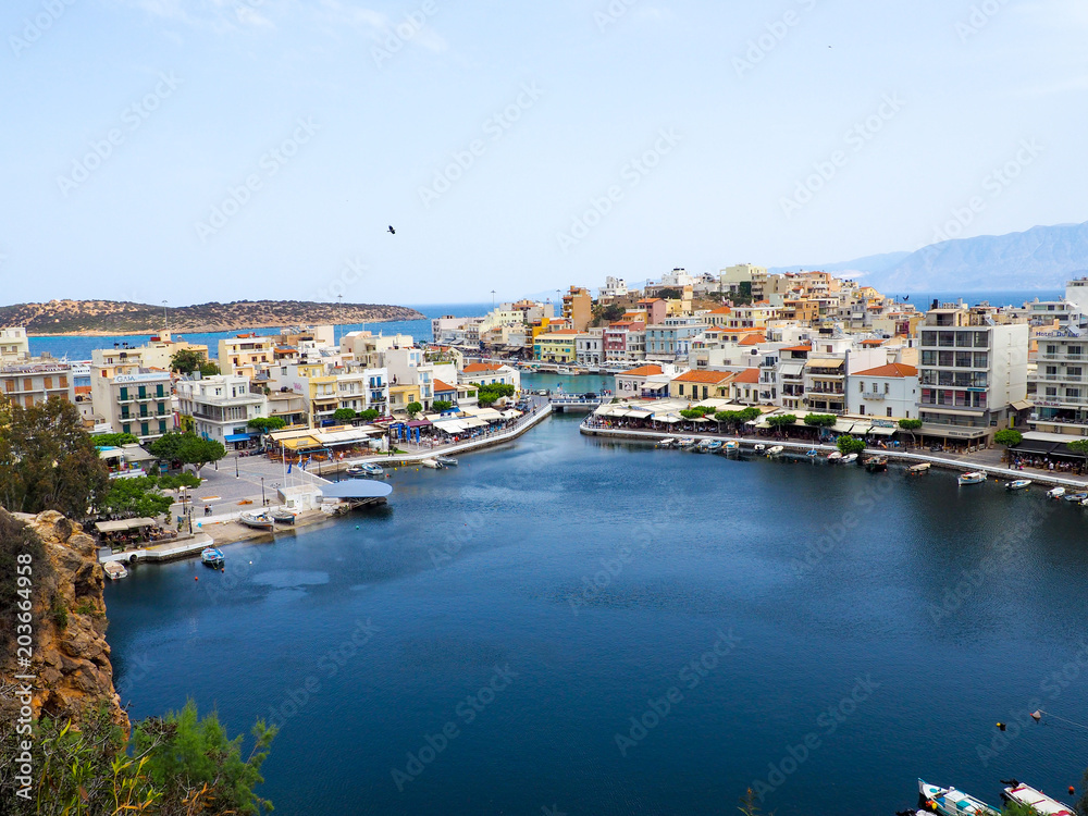 Agios Nikolaos, Crete island, Greece the Voulismeni lake, a picturesque town in the eastern part of the island Crete with colorful buildings, Lasithi