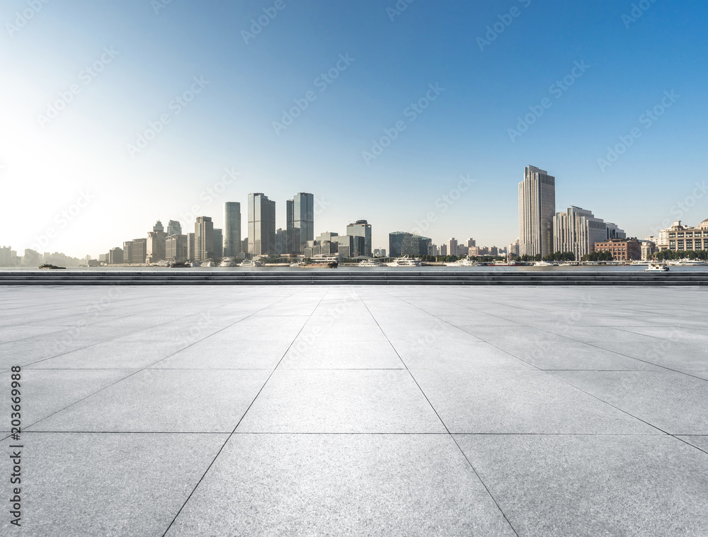 empty floor with panoramic cityscape empty floor with panoramic cityscape