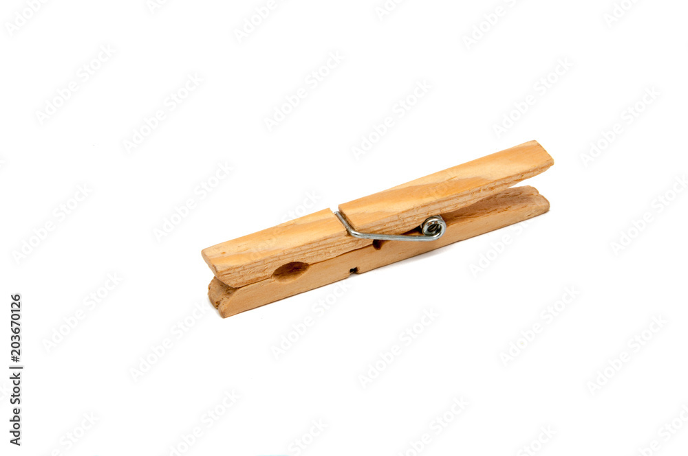 wooden clothes pegs isolated on the white wooden clothes pegs isolated on the white