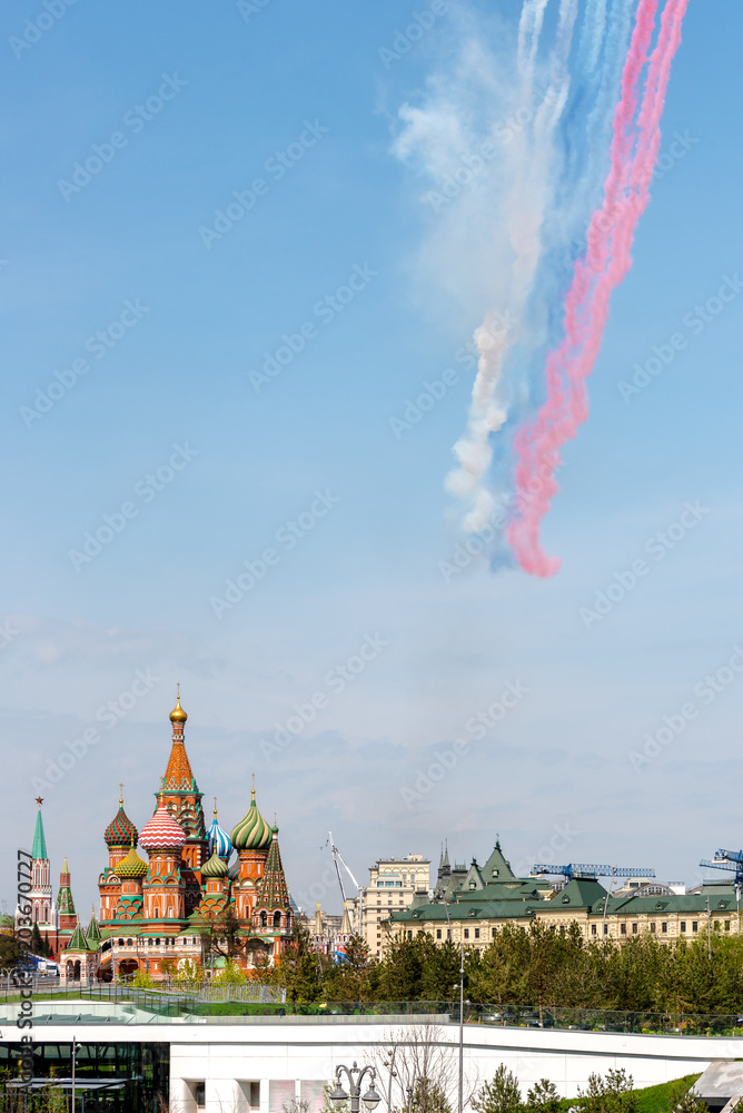 Moscow, Russia-may 4, 2018: a Group of Russian su - 25 fighters painted a Russian flag in the sky at a parade rehearsal for Victory day. 