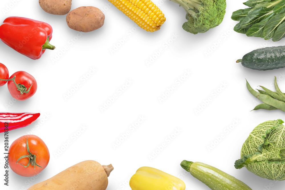 Healthy vegetables on white surface. Copy space in the middle. Healthy vegetables on white surface. Copy space in the middle.
