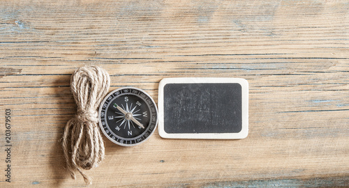 compass and rope on grunge background